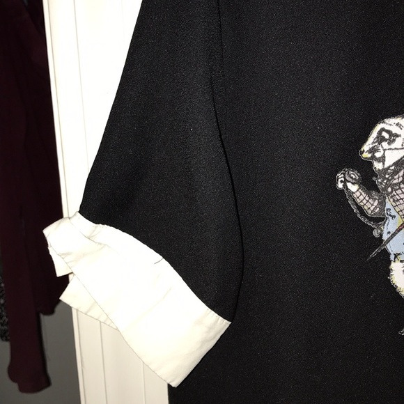 This is an “Alice and Wonderland” themed crop top - Picture 2 of 4